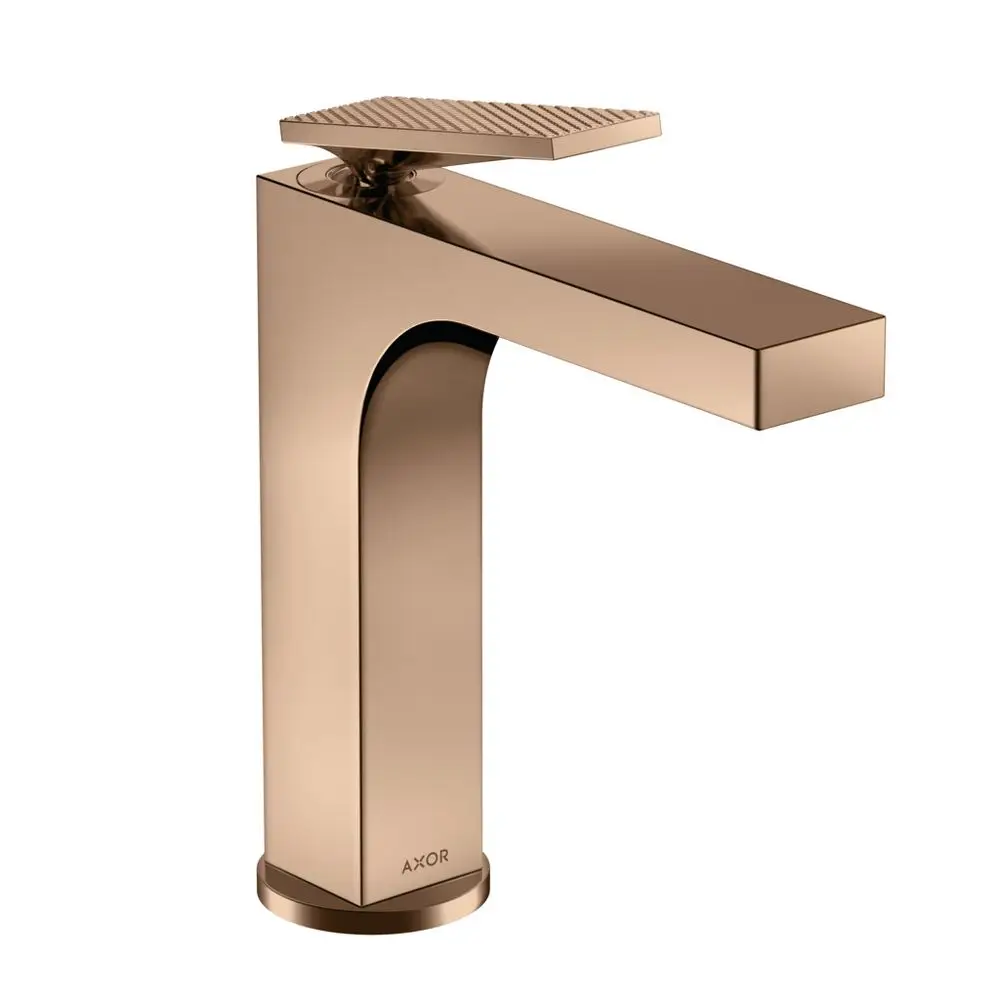 Einhebel-Waschtischmischer in Polished Red Gold mit schmalem Auslauf und Hebelgriff, gefertigt von AXOR, mit einer gerillten Bedienfläche.